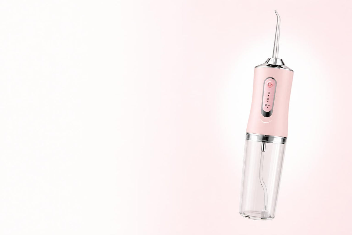 AquaJet irrigador dental portátil rosa