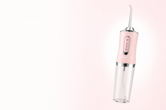 AquaJet irrigador dental portátil rosa